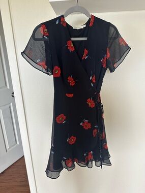All in Favor Black Mini Wrap Dress with Red Floral Print